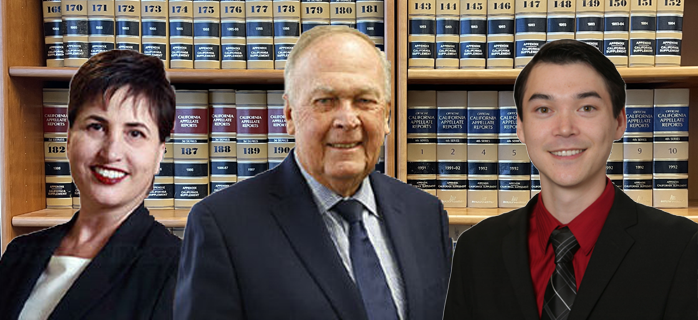 A man in suit and tie standing next to another person.